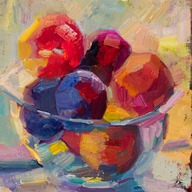 A bowl of plums and peaches